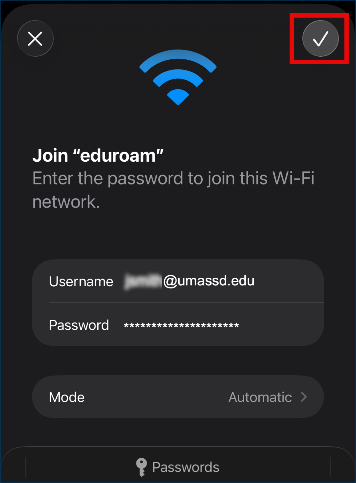 iOS Join eduroam screen showing UMassD username and password fields with the confirmation checkmark highlighted.