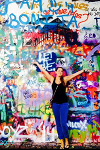 Maegan McConnell at the John Lennon Wall in Prague