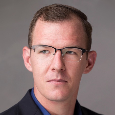 Dr. Travis L. Scholten
